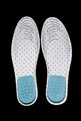  shoe insole with size markings on a black background