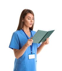 Female medical assistant reading book on white background