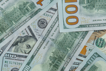 Close-up of pile of one hundred 100 dollars banknotes bills. Paper banknote, money, cash, currency, savings, finance.