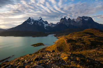 Naklejka na ściany i meble Torres del Paine National Park sunset view. Torres del Paine, mountain views, mountains, glaciers, lakes and rivers. Patagonia Chile.