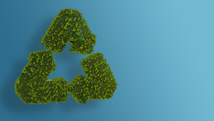 Recycle sign covered in trees