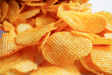Potato chips in open bag, delicious BBQ seasoning spicy for crips, thin slice deep fried snack fast food.