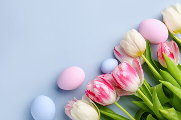 Composition with beautiful tulip flowers and Easter eggs on color background