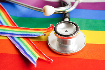 LGBT symbol, Stethoscope with rainbow ribbon, rights and gender equality, LGBT Pride Month in June. - obrazy, fototapety, plakaty