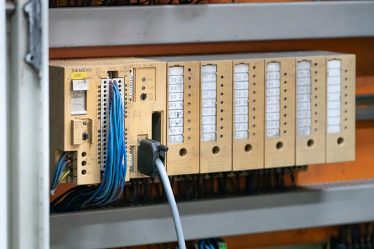old SIMATIC S5-95U model type PLC of SIEMENS which installed inside the electrical cabinet, illustrative editorial image.