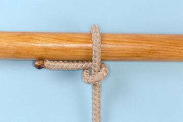 Rope knot Half hitch tied around a wooden pole