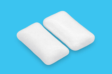 Three pieces of white chewing gum isolated on white. The whole subject is in focus.
