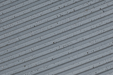 Fondo abstracto con detalle y textura de superficie con lineas diagonales, textura suave y acabado de piedra en tonos grises