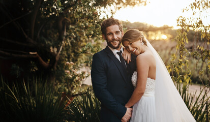 Wedding, love and portrait of couple in garden for marriage, ceremony celebration and commitment. Save the date, trust and bride and groom hug, embrace and happy for romance, loving and peace in park
