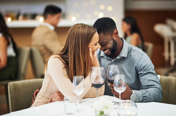 Funny, date and interracial couple with red wine for fine dining, luxury restaurant or valentines celebration together. Black man, happy woman and alcohol glasses for romance, wealth or anniversary