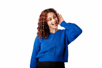 Beautiful woman wearing blue knitted sweater standing isolated over white background bewildered,...