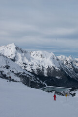 Ski in winter season, mountains and ski touring on the top of snowy mountains in Tirol, Austria.
