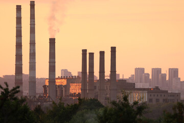 Fototapeta na wymiar power station. industrial landscape with city background