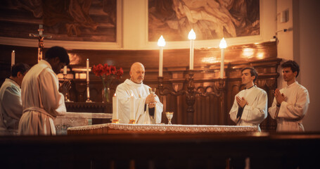 The Eucharist Service In Grand Church: Ministers of Christian Faith lead The Ceremony that Involves Sharing Bread in Honor of Jesus Christ. Holy Communion, Divine Mass, Lord's Supper at the Altar