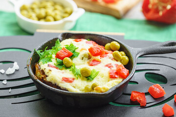 omelet baked with vegetables and cheese
