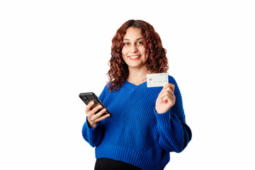 Young woman smiling confident standing isolated over white background holding a credit card and a...