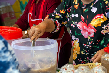 Roasted cashew nuts for sale at the street market in Thailand