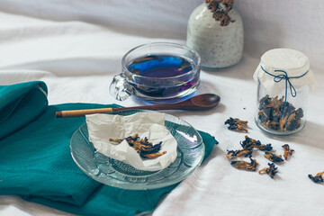 Healthy herbal butterfly pea tea showing the candid moments of home life, slow living and spring aesthetic