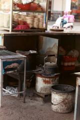 Old and rustic kettle at a street food stall showing the authentic daily life and culture of the khmer people in Kampot, Cambodia