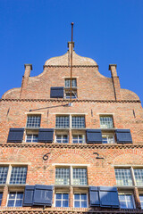 Blinds on the facade of a historic house in Deventer, Netherlands