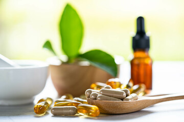 Alternative medicine herbal organic capsule with vitamin E omega 3 fish oil, mineral, drug with...