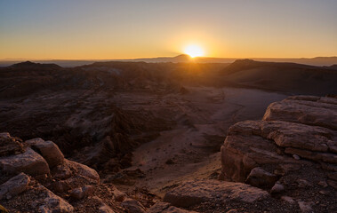sunset in the moon valley in atacama desert, chile