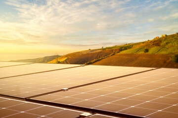 solar panels on top mountain at sunrise,renewable energy. sustainable energy to businesses, homes,...