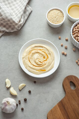 Cooking hummus from chickpeas on the table. curly background. Veganism.