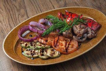 Chopped baked mushrooms, tomatoes, zucchini, pepper and onion rings with dill