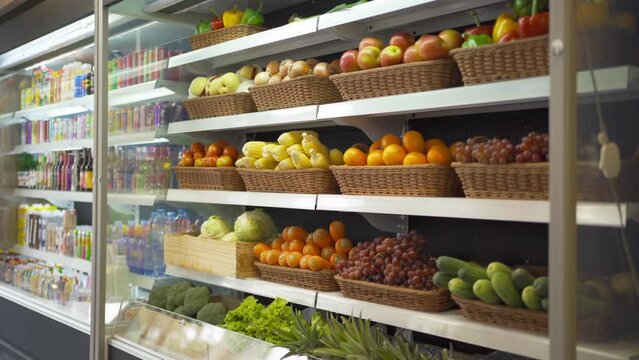 Fruits in supermarket or minimart retail shop and food on grocery products. Food shopping. People lifestyle. Business service.
