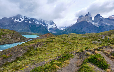 Naklejka na ściany i meble mountain view of torres del paine in chile with river