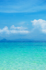 Fototapeta na wymiar Idyllic view of the ocean and sky. Blue sea background. Phuket, Thailand. Traveling concept.