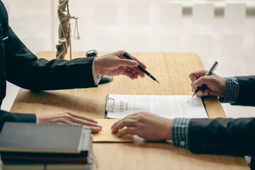 Bribery and legal corruption concept, lawyer or judge taking bribe In the courtroom of a client at...