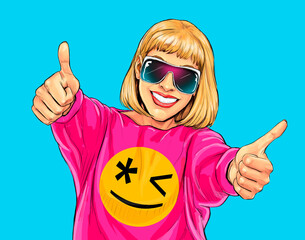Smiling woman in glasses showing like sign. Pop art young happy smiling  girl  or teenager cartoon character showing thumbs up. Success and goal achievement facial expression - 569202526