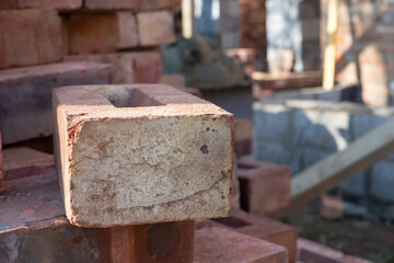 Building site: bricks and mortar for an extension, part of a renovation of an Edwardian suburban house in north London, UK