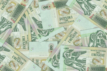 Fototapeta na wymiar The Uruguayan currency - the Uruguayan peso. Macro view of Uruguay paper money. Close-up Uruguay money
