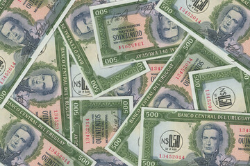 The Uruguayan currency - the Uruguayan peso. Macro view of Uruguay paper money. Close-up Uruguay...