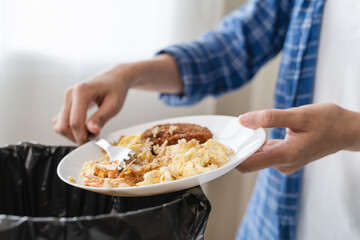 people put bio trash from food waste in domestic homes to compost bins to make fertilizer to reduce global environmental pollution.