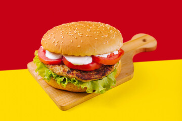 Burgers with cutlet, tomato and lettuce