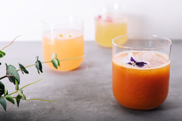 Fresh carrot juice and chamomile syrup with lemon