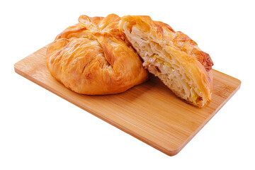 Baking puff pastry with fresh cabbage on wooden