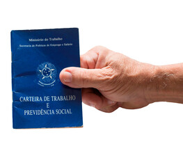 Hand holding Brazilian work card. labor portfolio and social security