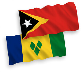Flags of Saint Vincent and the Grenadines and East Timor on a white background