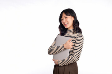 Obraz premium Beautiful young Asian woman on sweater clothing holding laptop pc computer and looking at camera with smile face, isolated on white background