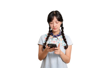 Portrait of happy beautiful young asian woman in denim dress using a smartphone on white background. studio shot