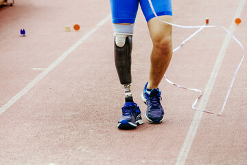 Naklejka premium disabled athlete measures run-up measuring tape