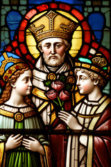 Obraz premium Saint Valentine blesses, crowns the marriage of a girl and a boy. Christian icon. Christian stained glass. Valentine's Day.