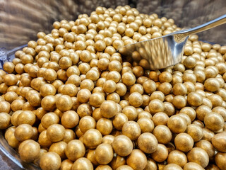 Nuts in glaze. Nuts in chocolate. Hazelnuts in golden glaze. Hazelnuts in golden chocolate. Natural candies. Natural sweets