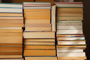 Fototapeta premium Big pile of books on the table.