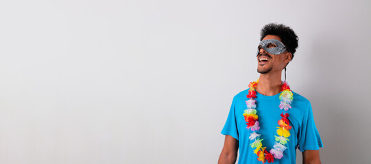 Brazilian Black Man With Carnival Costume and Mask Smiling Isolated on White.